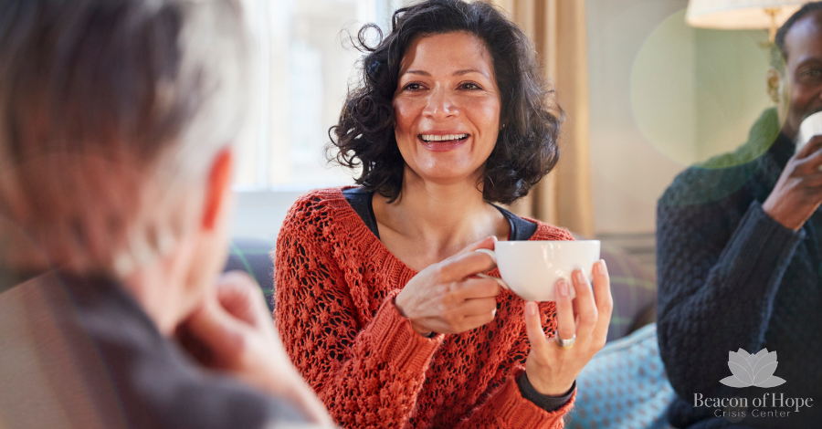People smiling enjoying coffee